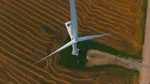 An aerial photograph of a wind turbine.